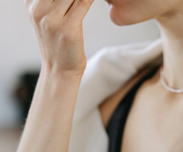 Close up of a person's chest expanding with a deep breath.